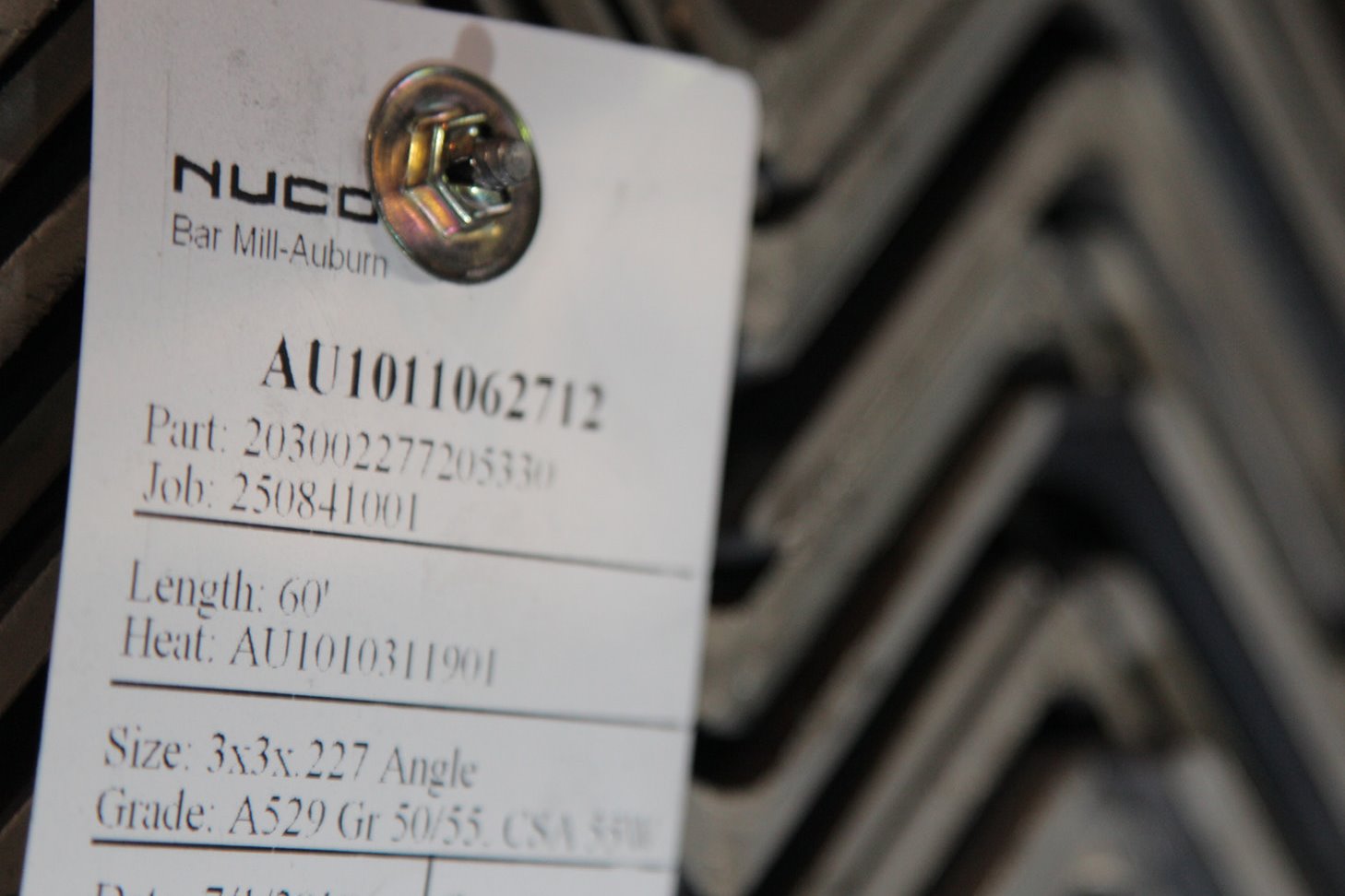 Photo of a tag attached to Nucor steel angles