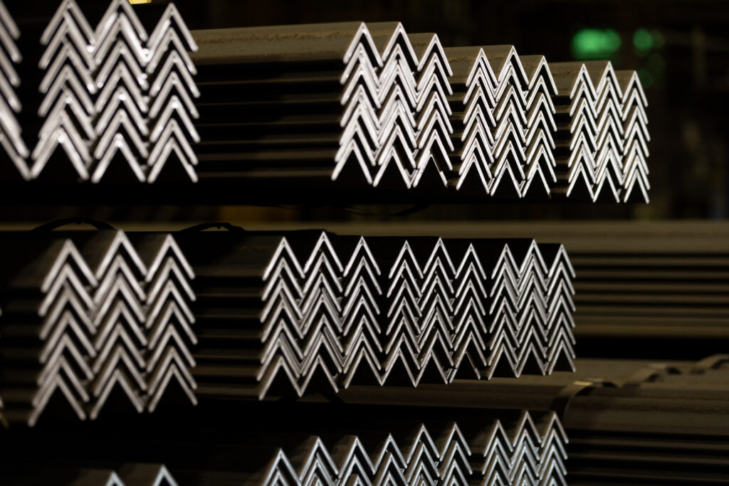 Photo of Nucor steel angles stacked on shelves