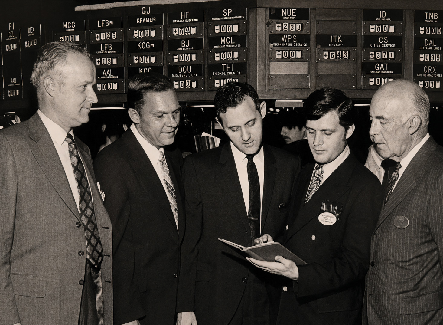 Ken Iverson and Sam Seigel standing at the New York Stock Exchange